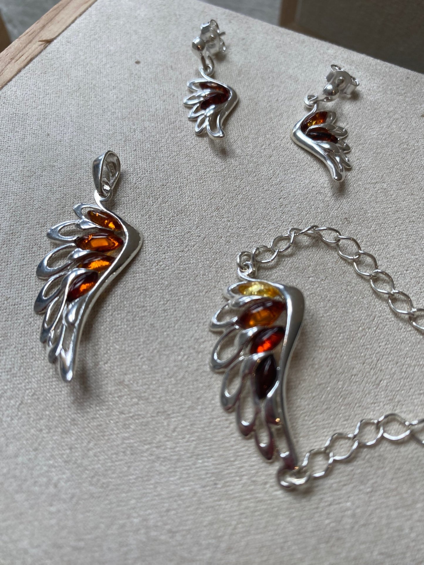 Angel Wing Pendant in Sterling Silver with Cognac Baltic Amber - Louise's Jewellery Box
