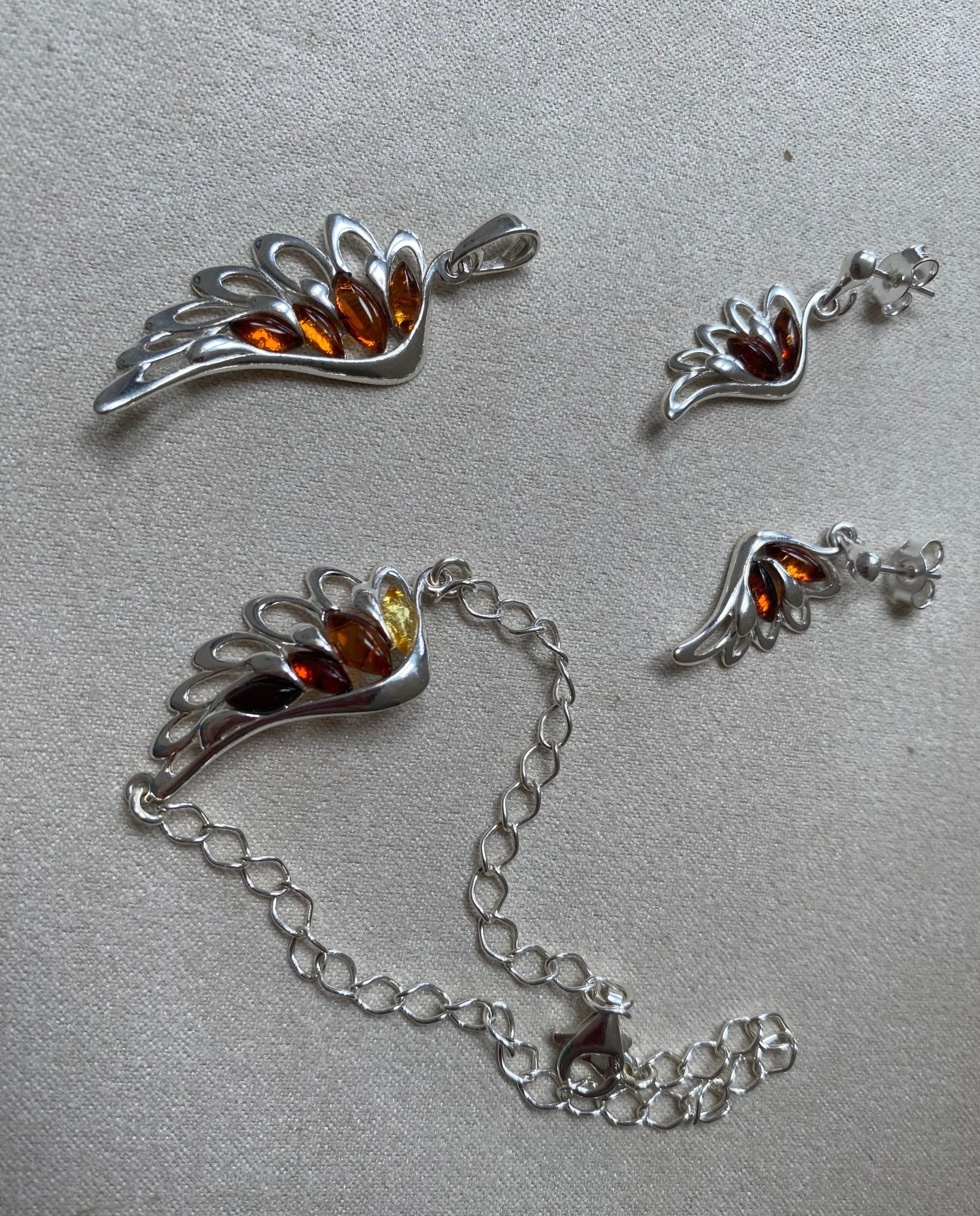 Angel Wing Stud Earrings in Sterling Silver with Cognac Baltic Amber - Louise's Jewellery Box