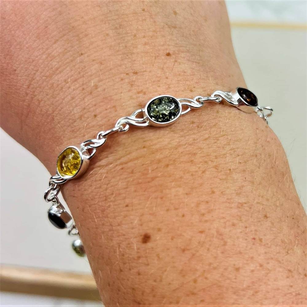 Celtic Inspired Link Bracelet in Sterling Silver with Mixed Baltic Amber Stones - Louise's Jewellery Box
