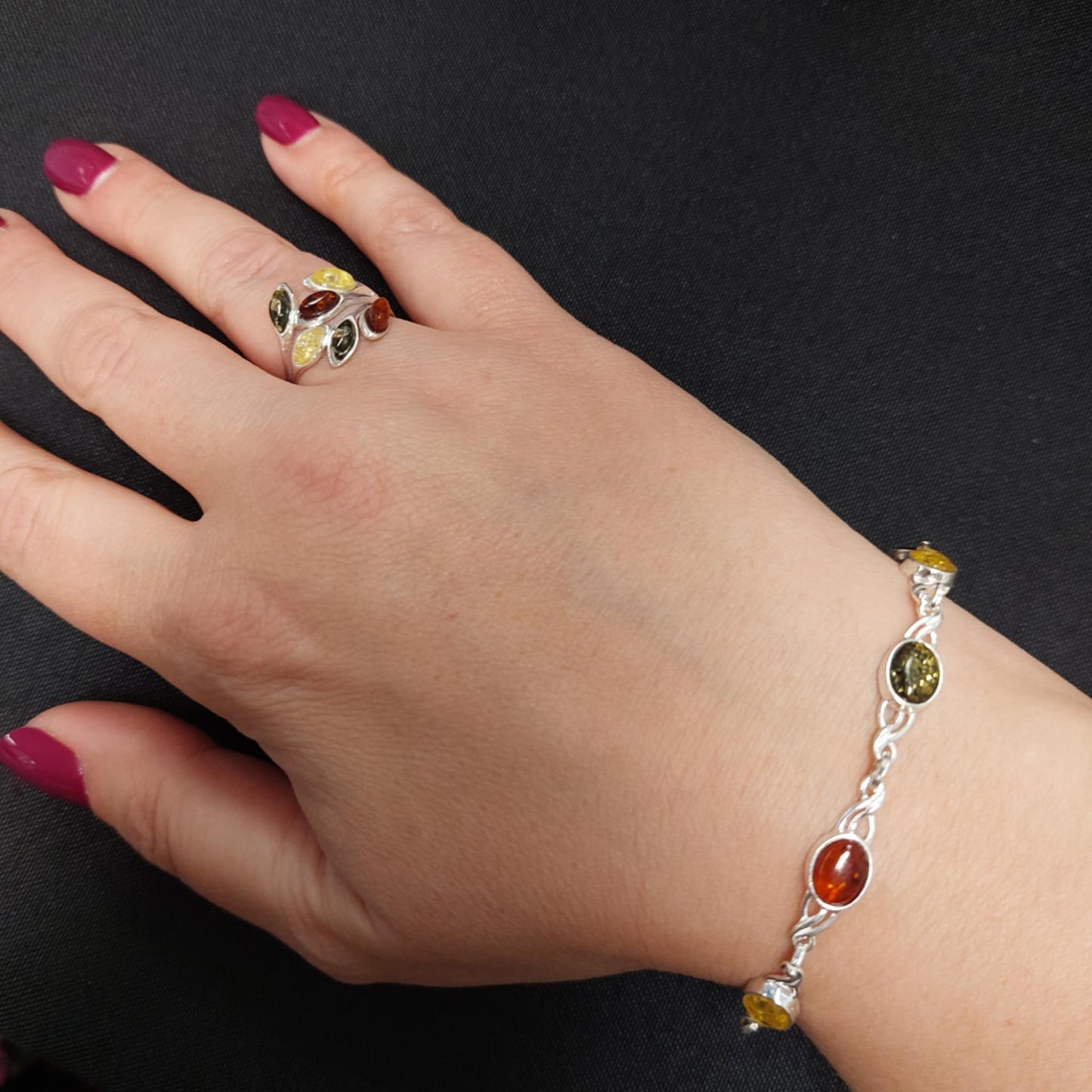 Multicolour Baltic amber petal ring with matching Celtic link bracelet in sterling silver