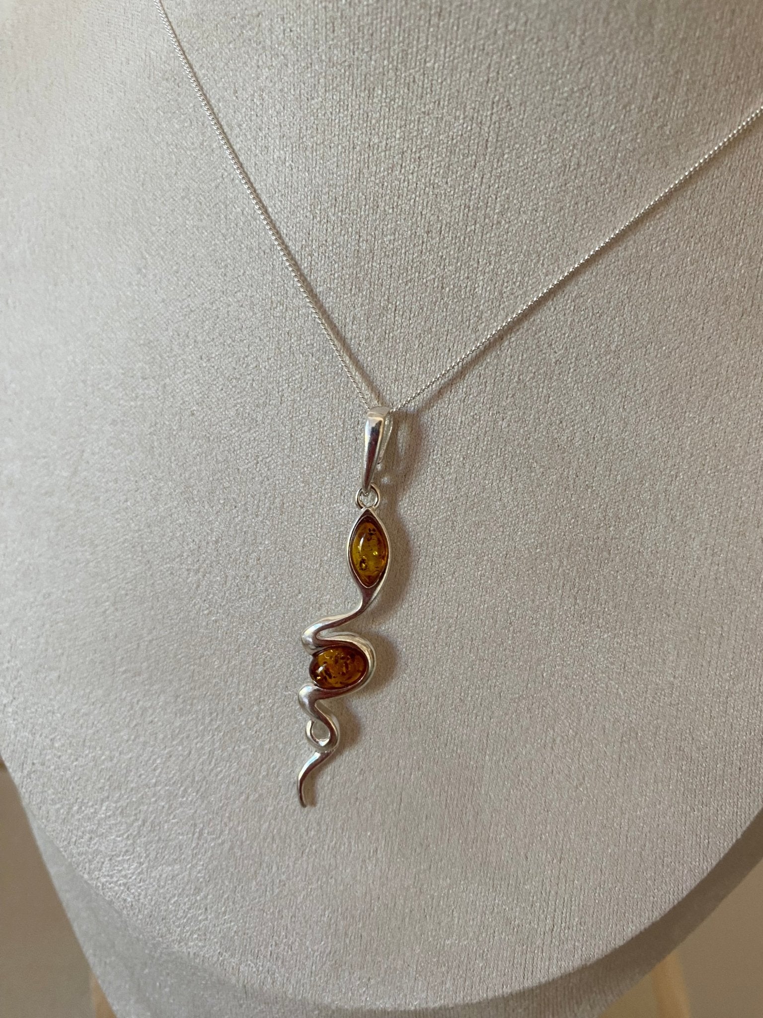 Modern Snake Pendant in Sterling Silver with Cognac Baltic Amber - Louise's Jewellery Box