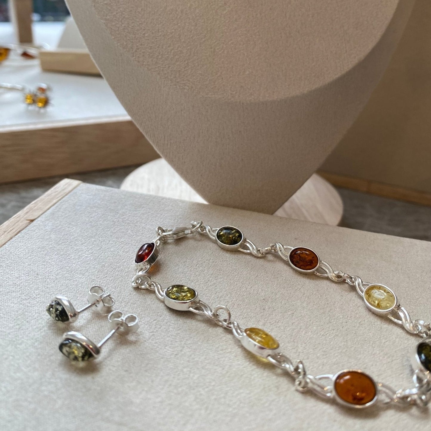 Green Baltic amber leaf earrings with matching bracelet by Louise's Jewellery Box
