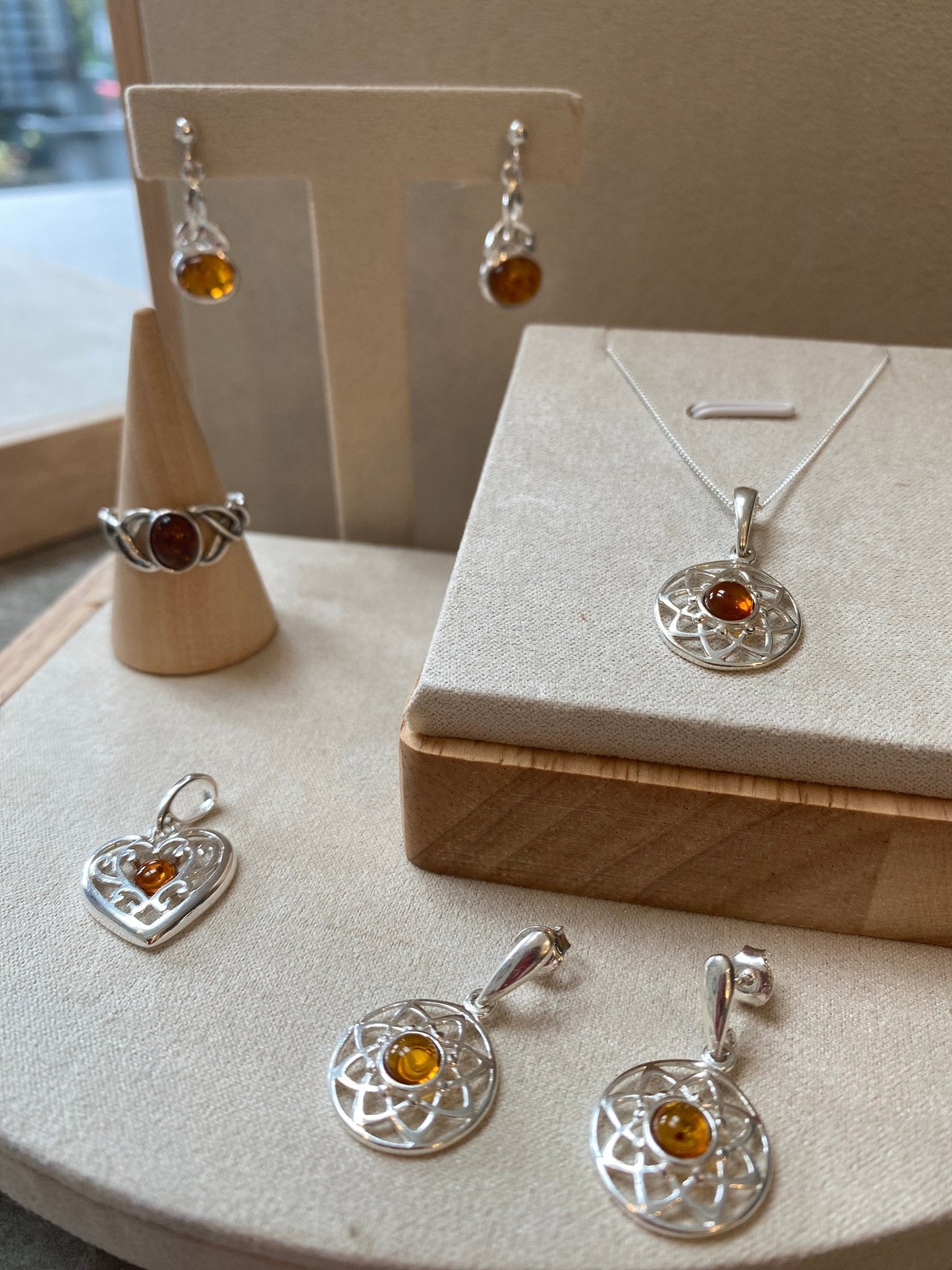 Round Celtic Stud Drop Earrings in Sterling Silver with Cognac Baltic Amber - Louise's Jewellery Box