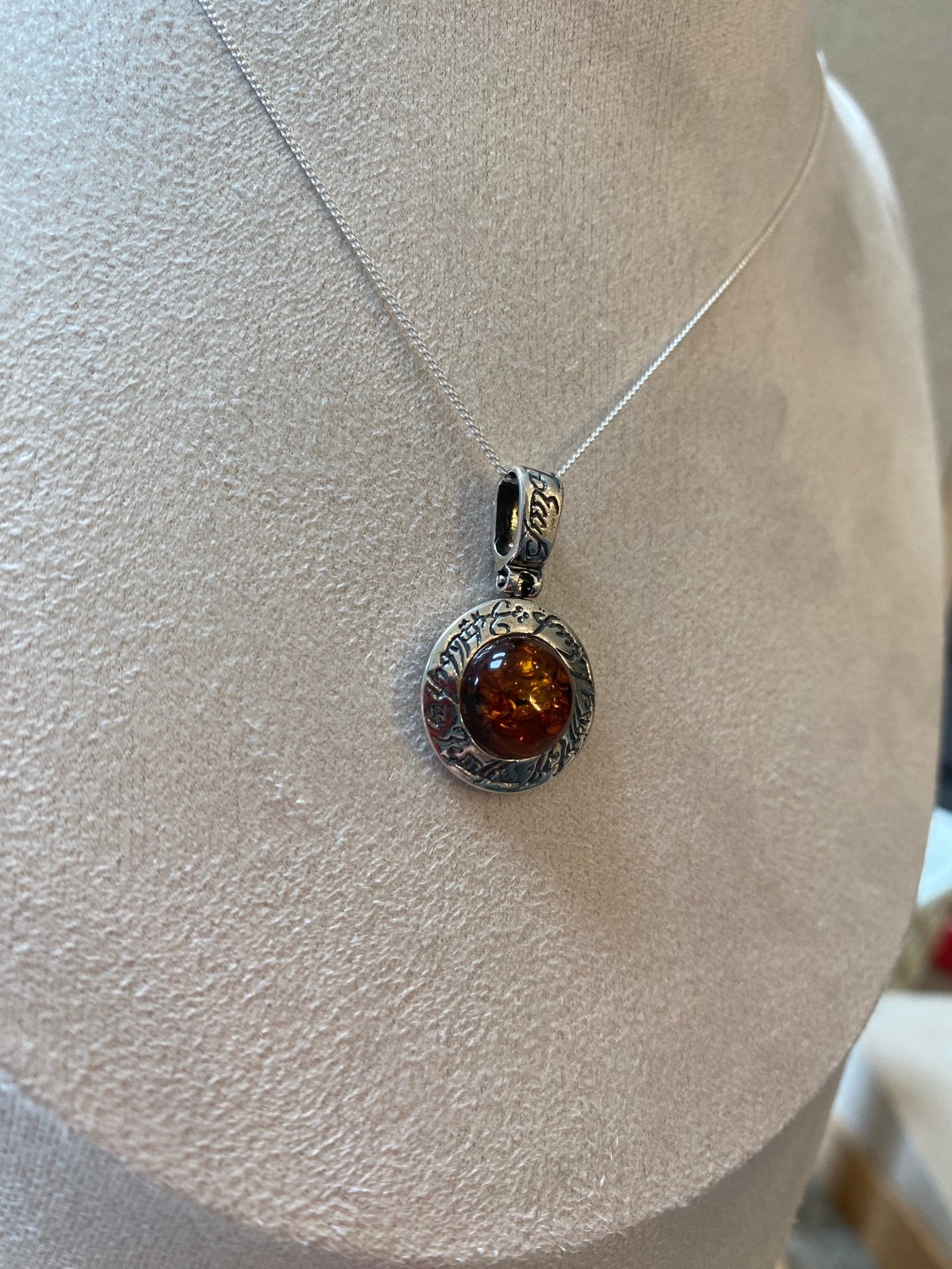 Round Stirling Silver Pendant with Cognac Baltic Amber Stone and Mystical Etchings - Louise's Jewellery Box