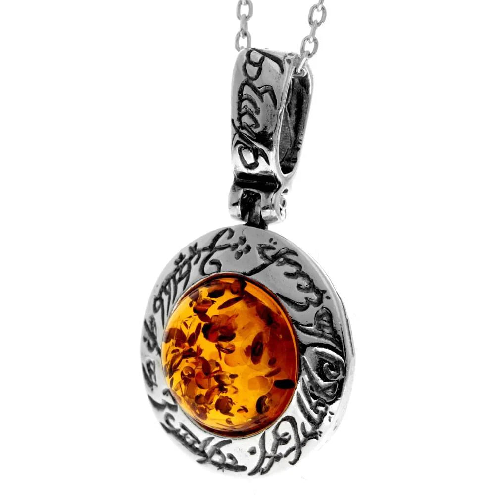 Round Stirling Silver Pendant with Cognac Baltic Amber Stone and Mystical Etchings