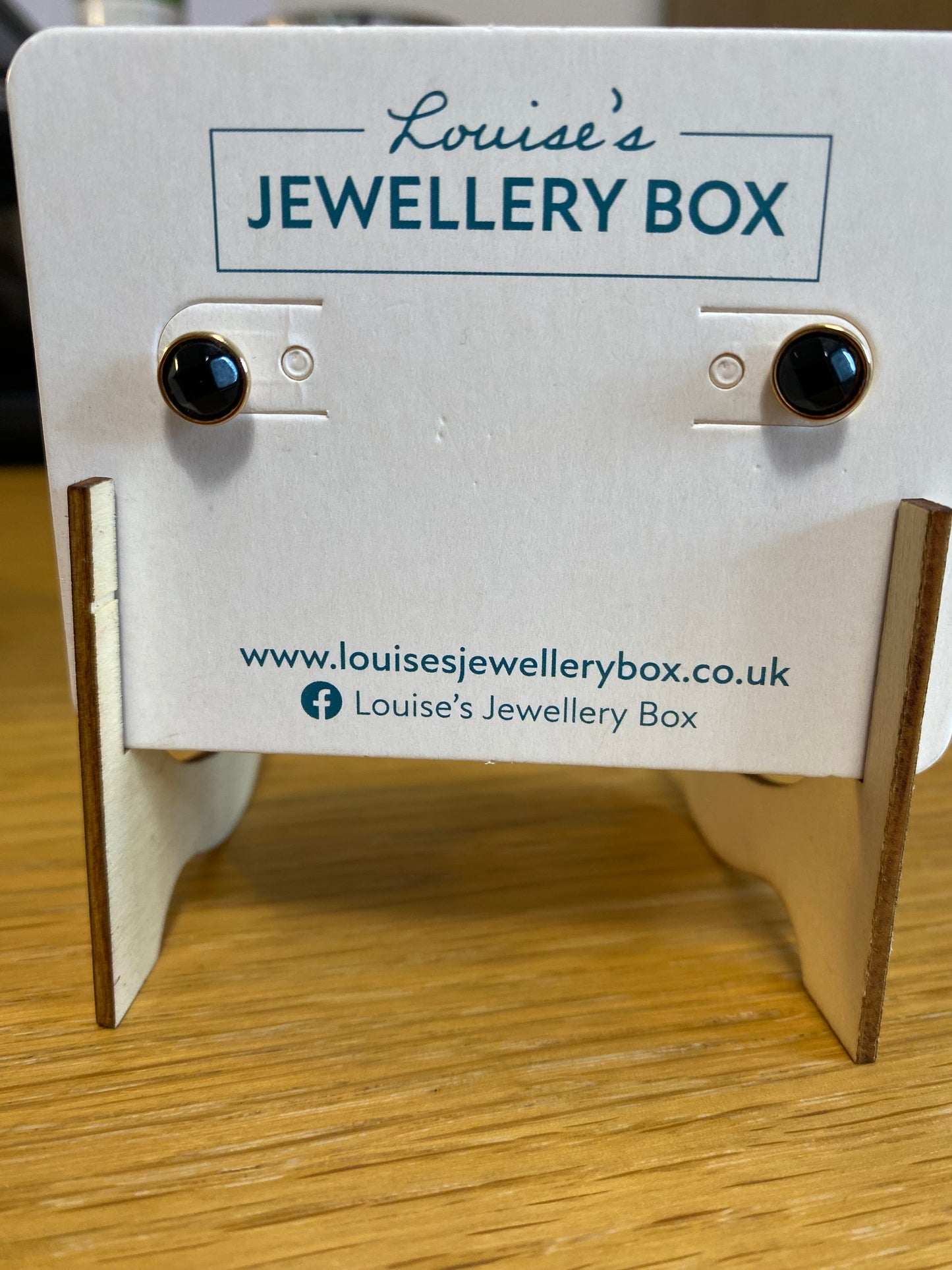 Venus Black Spinel Stone Studs In Gold Plating