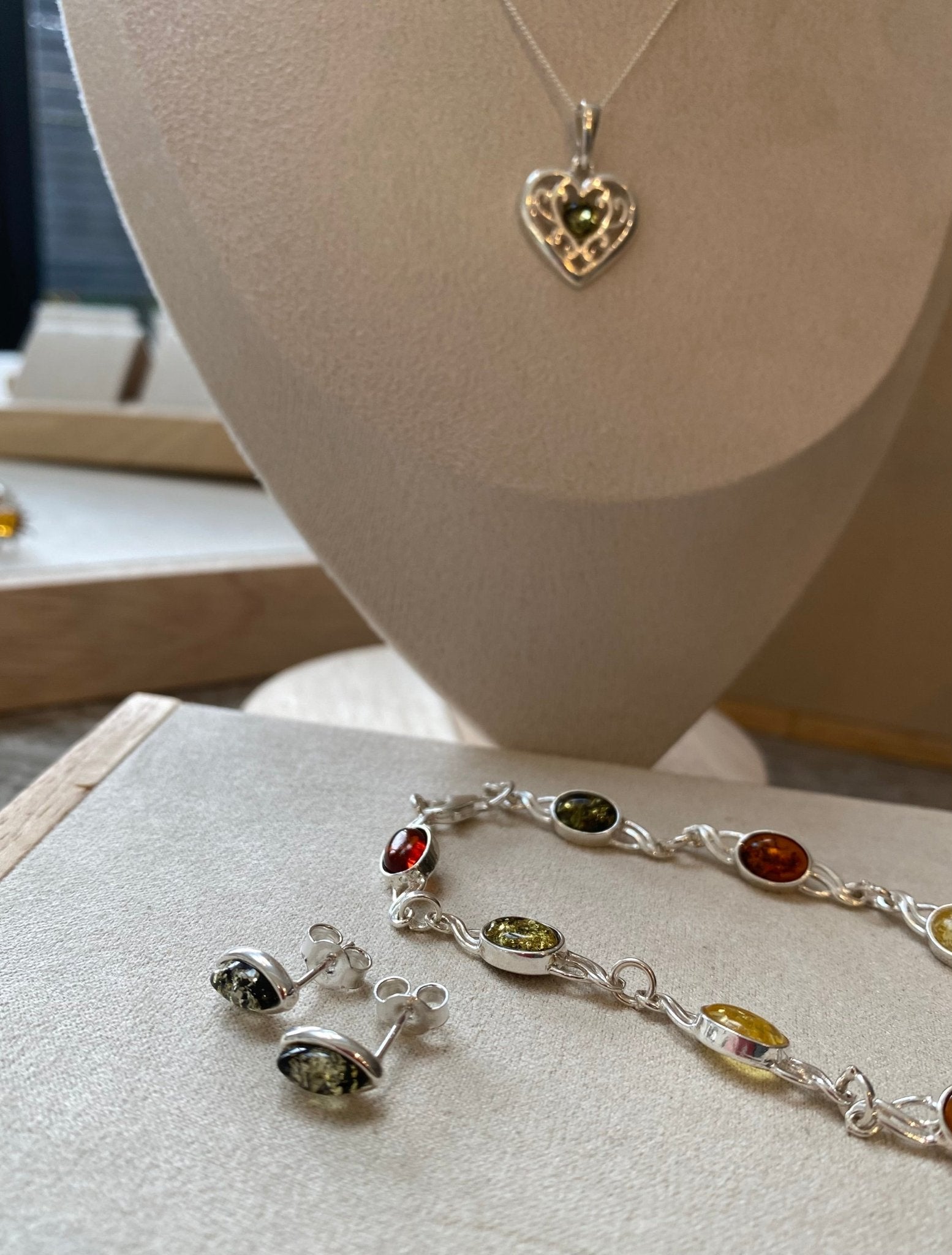 Celtic Heart Pendant in Sterling Silver with Green Baltic Amber - Louise's Jewellery Box
