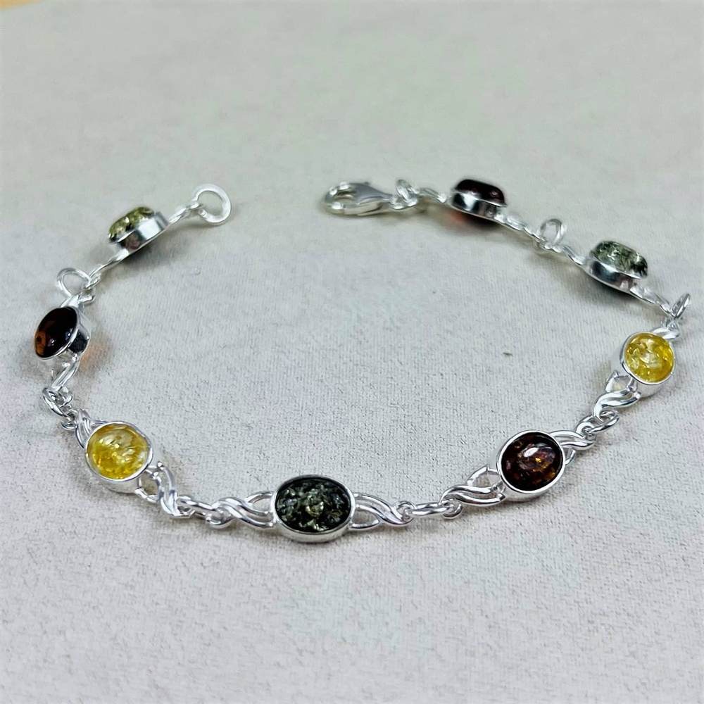 Celtic Inspired Link Bracelet in Sterling Silver with Mixed Baltic Amber Stones - Louise's Jewellery Box