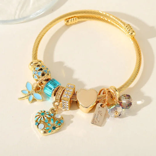 Gold Plated Waterproof Flexible Bangle with Blue Lucky Charms - Louise's Jewellery Box