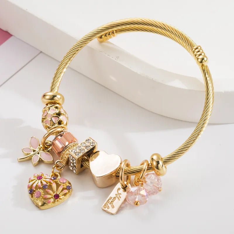 Gold Plated Waterproof Flexible Vangle with Pink Lucky Charms - Louise's Jewellery Box