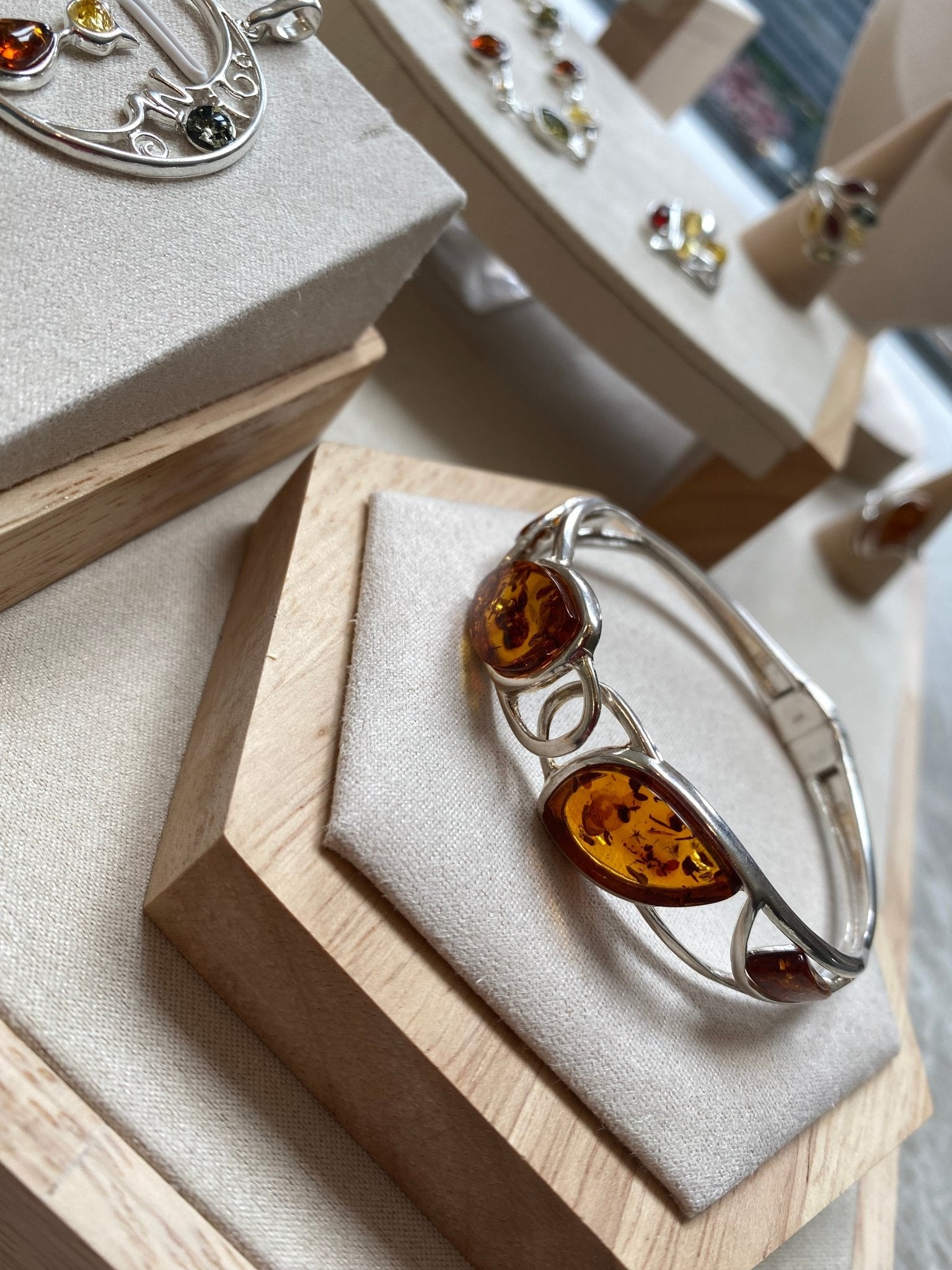 Hinged Bangle in Sterling Silver with Cognac Baltic Amber - Louise's Jewellery Box