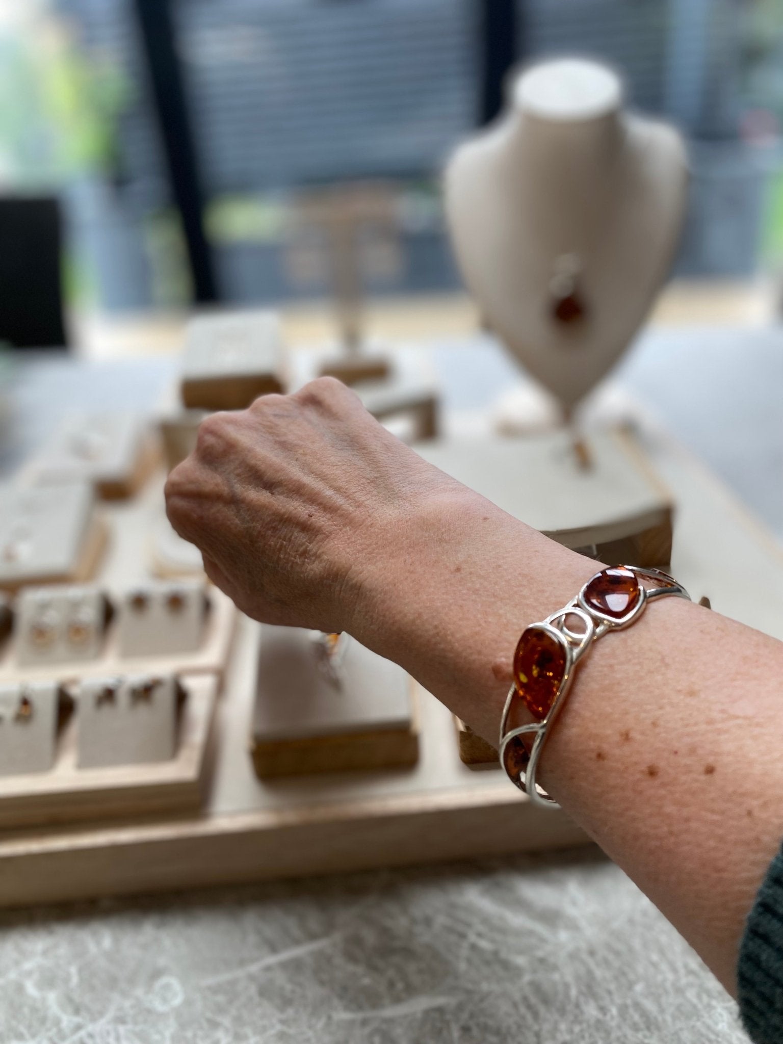 Hinged Bangle in Sterling Silver with Cognac Baltic Amber - Louise's Jewellery Box