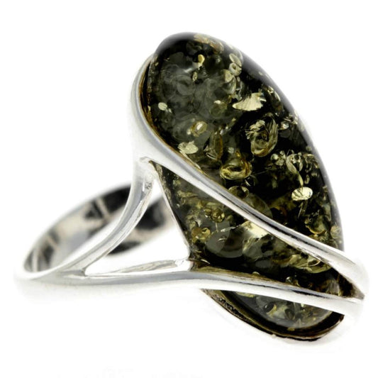 Large green Baltic amber adjustable ring in sterling silver with natural inclusions

