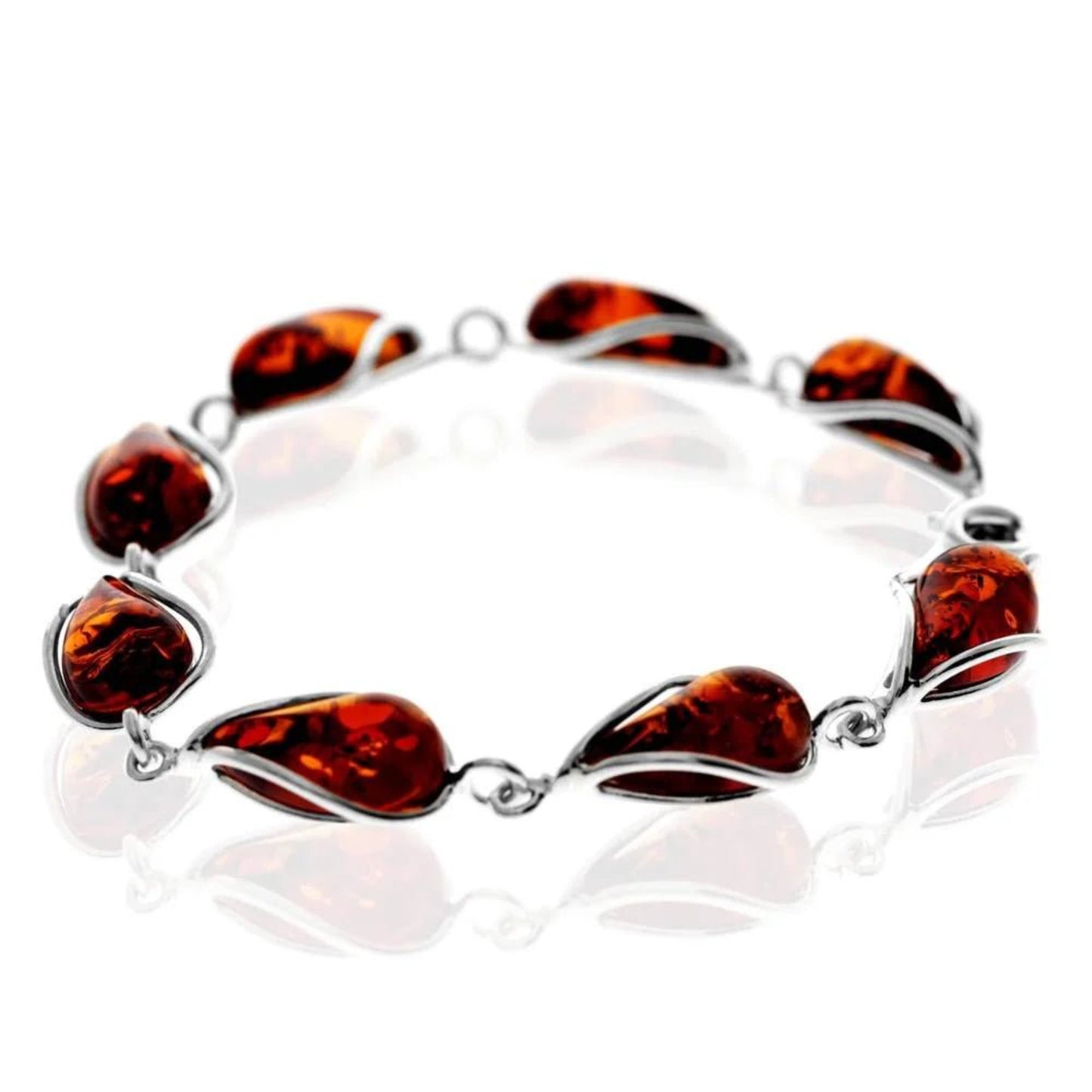 Cognac baltic amber bracelet in sterling silver with glossy finish and teardrop shaped gemstones.