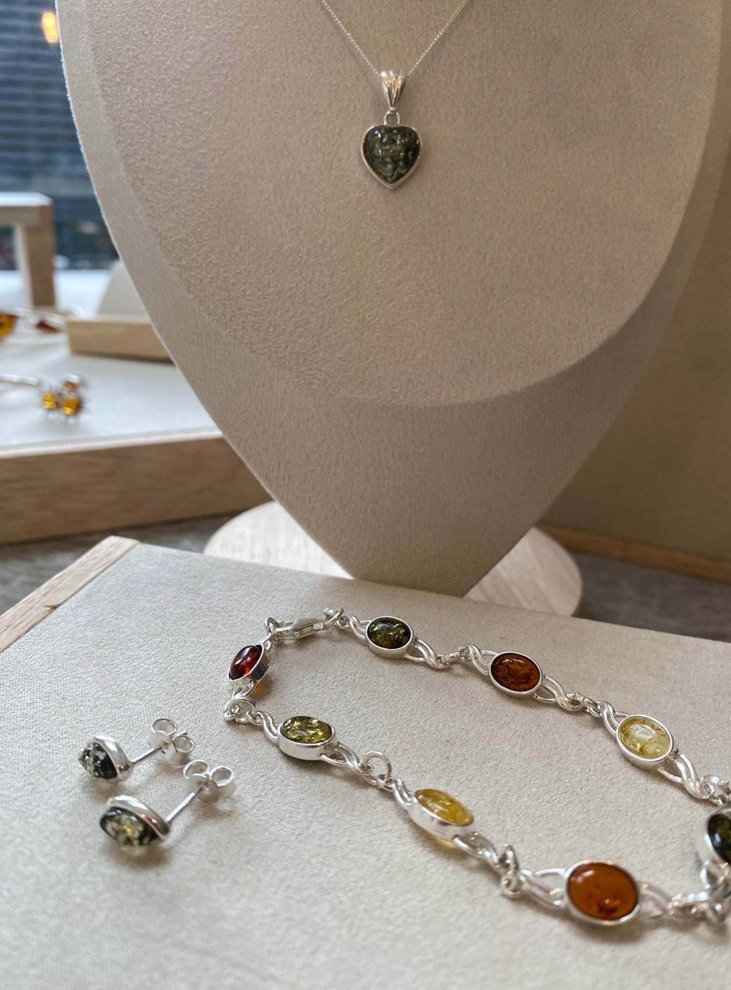 Oval Stud Earrings in Sterling Silver with Green Baltic Amber - Louise's Jewellery Box