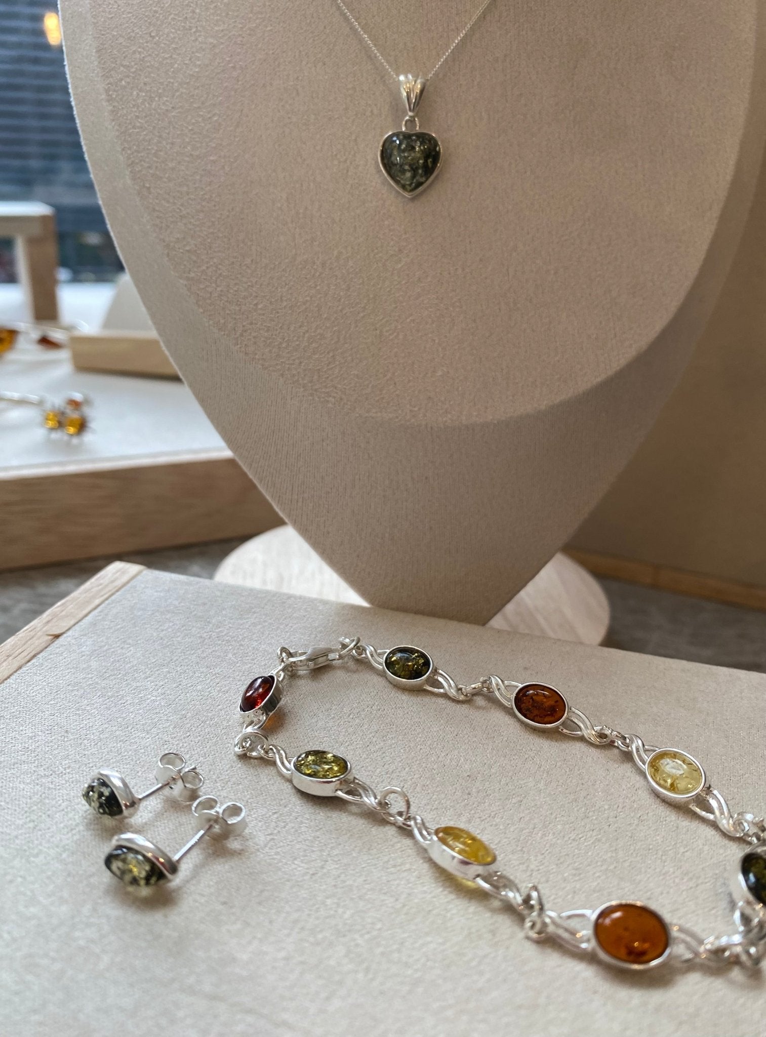 Oval Stud Earrings in Sterling Silver with Green Baltic Amber - Louise's Jewellery Box